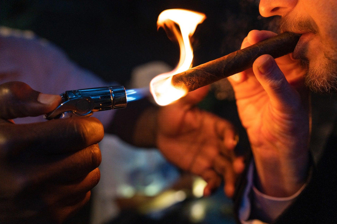 Man lighting blunt with butane torch - Shell Shock