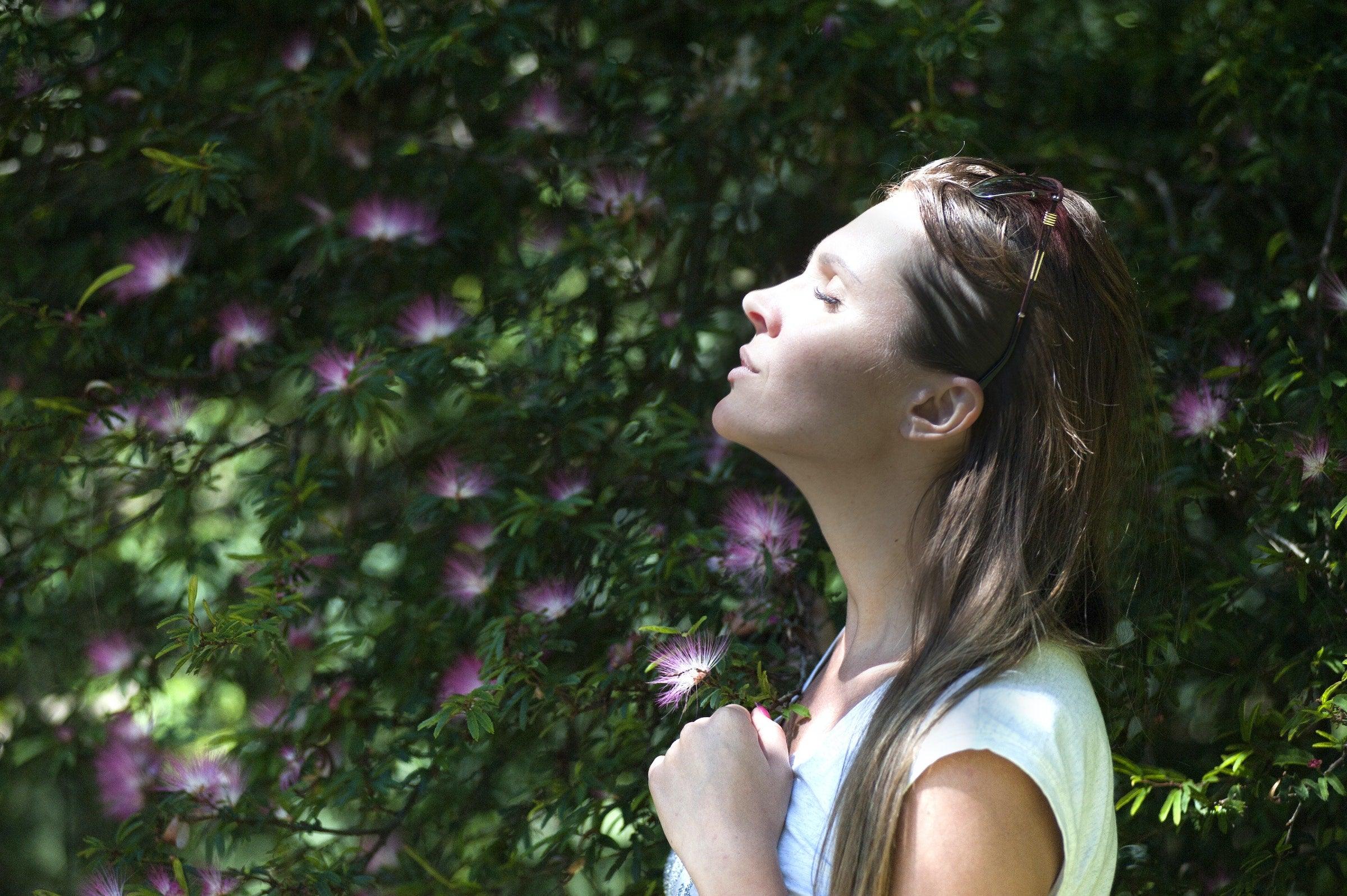 Woman smelling fresh scents of Smokebuddy