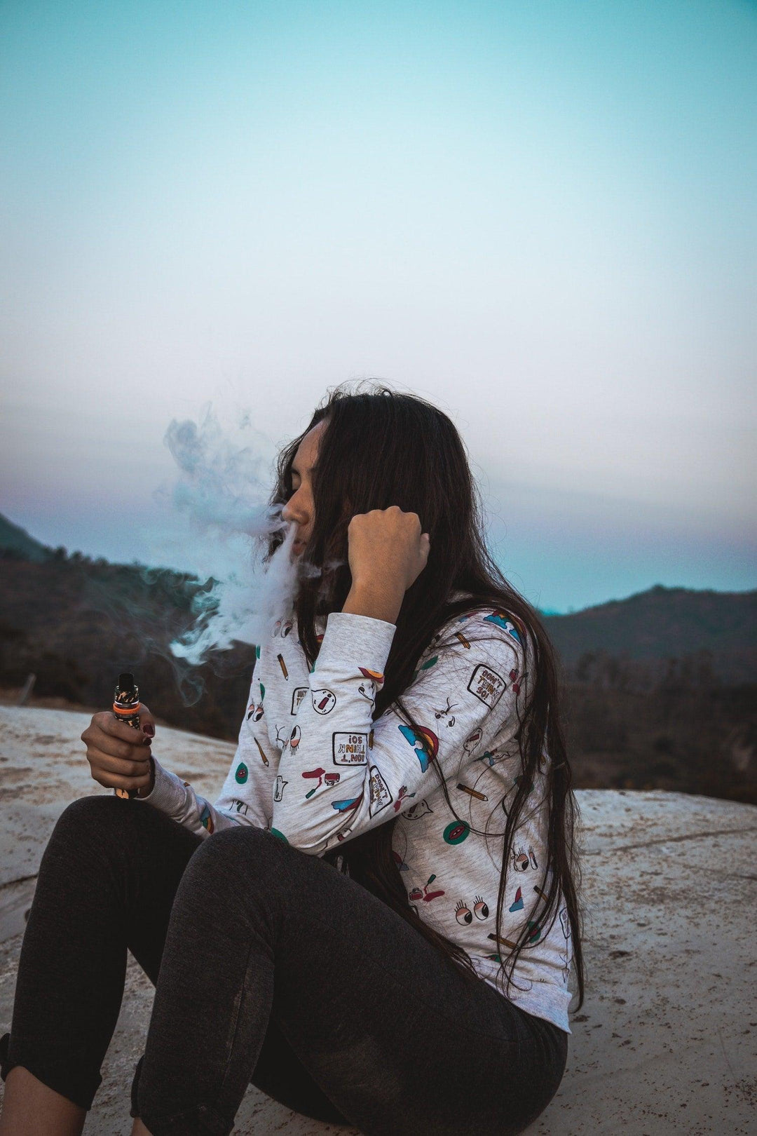 Girl Smoking Vape - Shell Shock