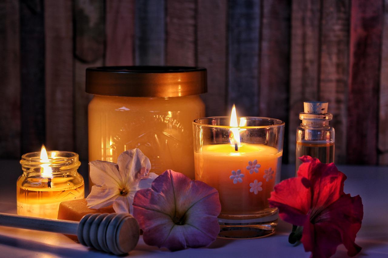 Smoke odor candles burning on table